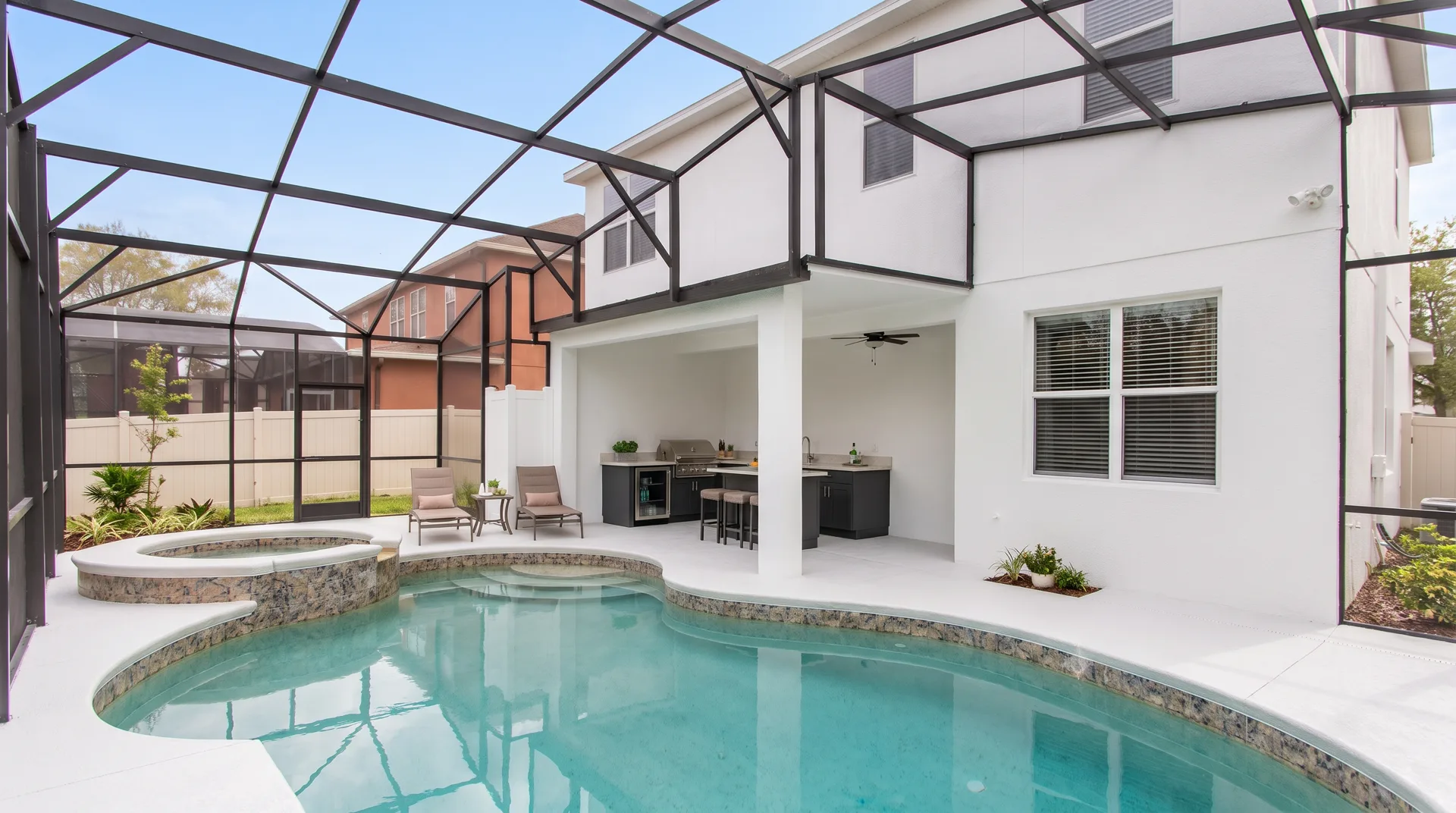 AI-assisted renovation concept: screened pool and lanai with proposed outdoor kitchen and light deck.